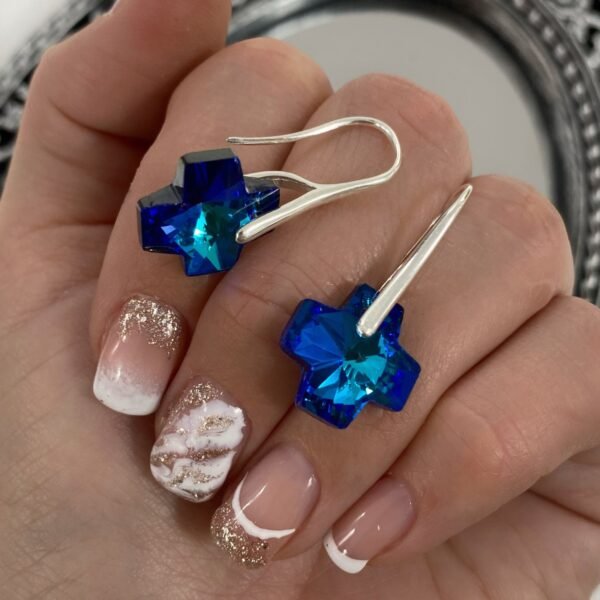 a argollas diseño cr cruz equilibrio azul